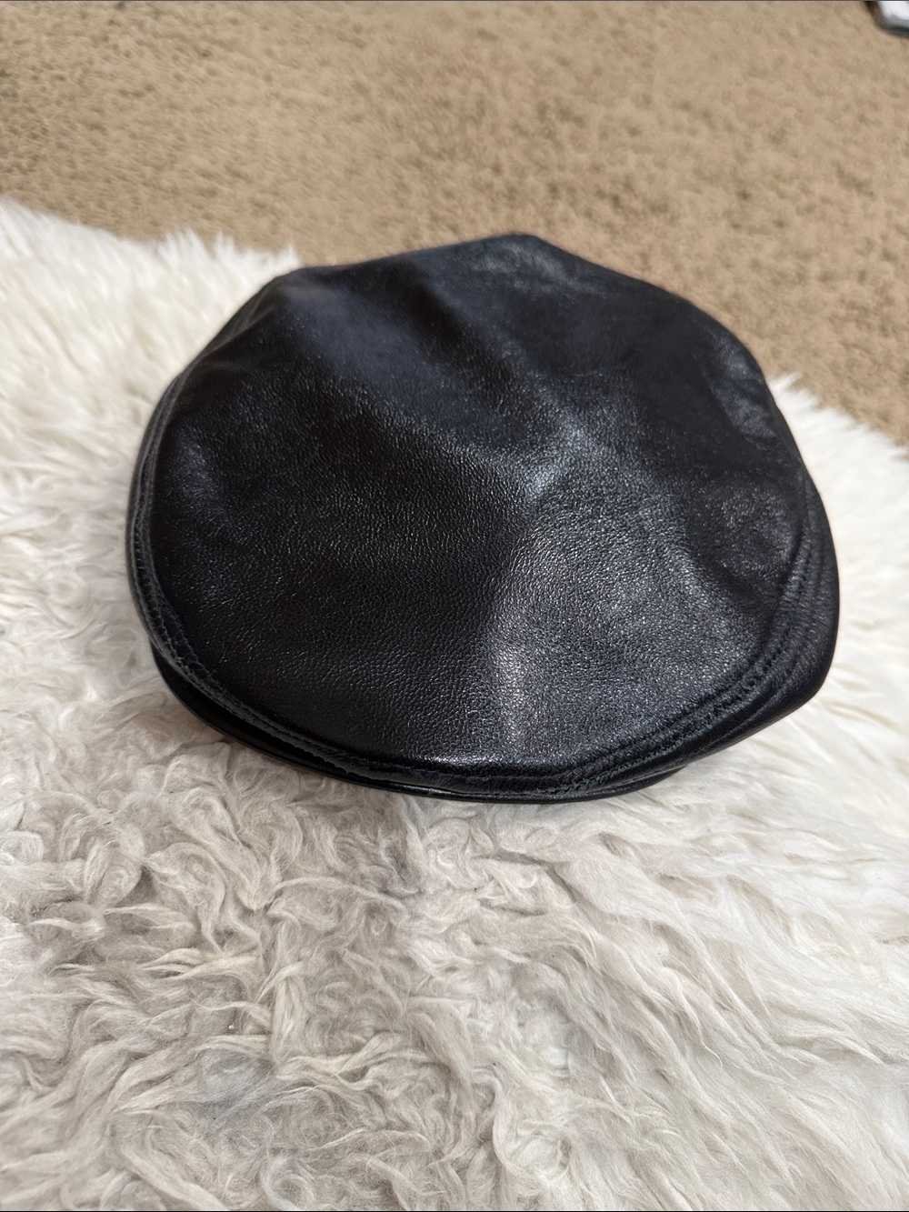 vintage lambskin beret hat
manufactured in the U.S.A. by the United Hatters